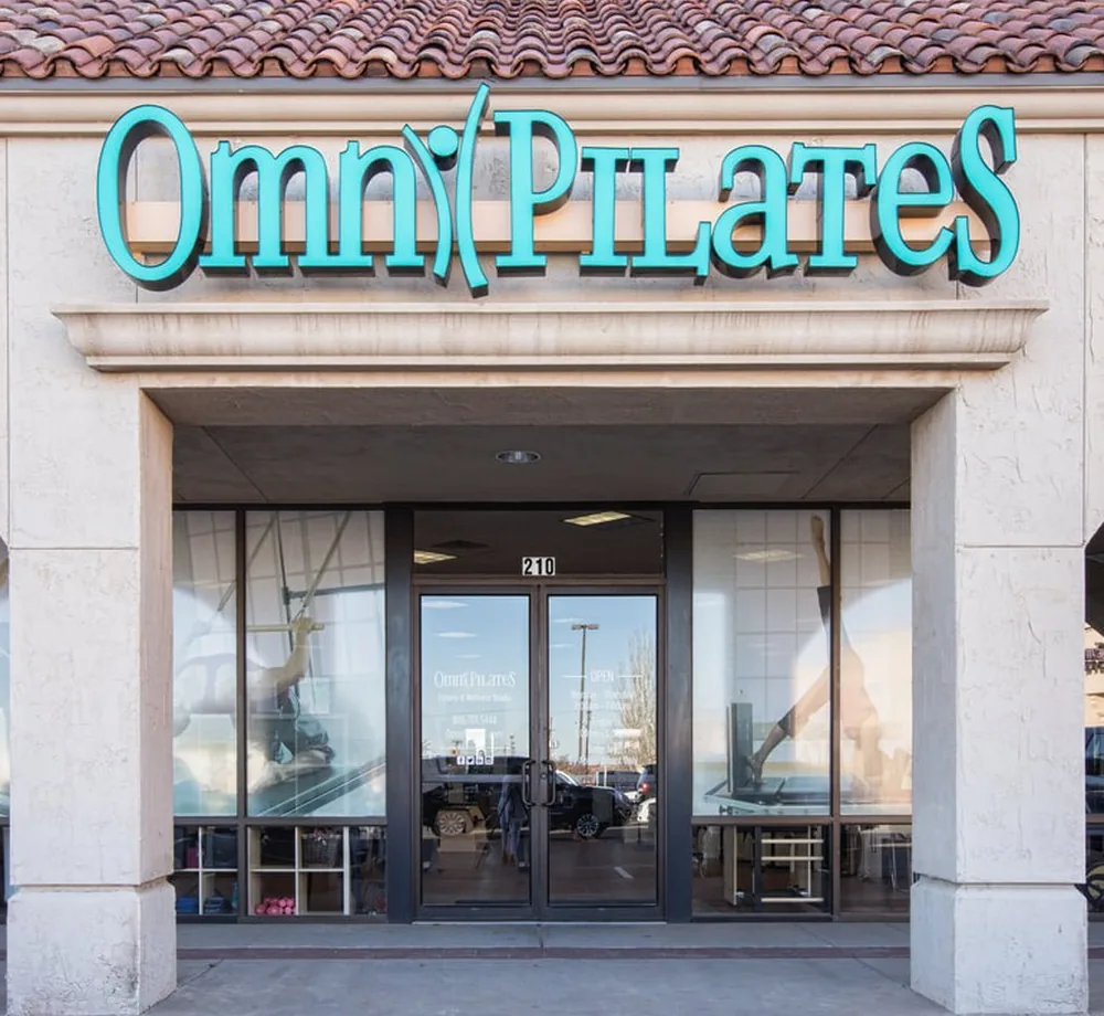 Omni Pilates storefront on 82nd Street in Lubbock, Texas