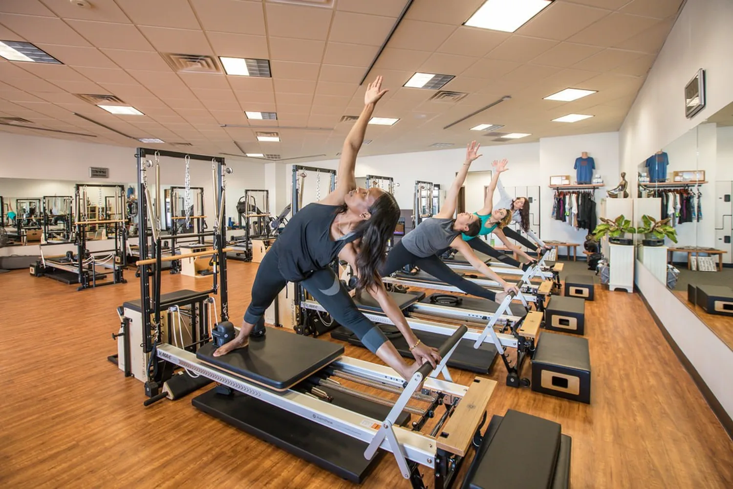 Reformer Pilates class in progress at Omni Pilates in Lubbock